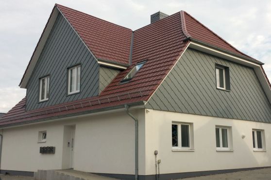 Energetische Dachsanierung, Mehrfamilienhaus.